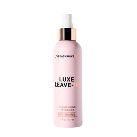 Beachwaver front bottle view showing Luxe Leave-In detangler and styling ease