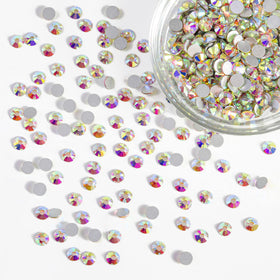 BEADSLAND rhinestones applied to nail art showing adhesive compatibility benefit