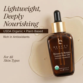 Beauty by Earth ingredients flatlay with bottle and seed extracts