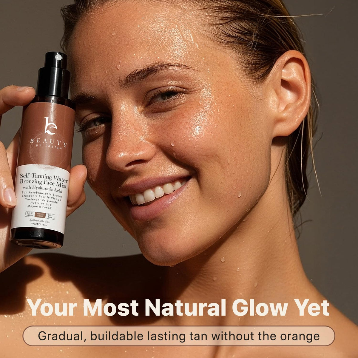 Beauty by Earth bottle in hand for size and scale showing travel-friendly benefit