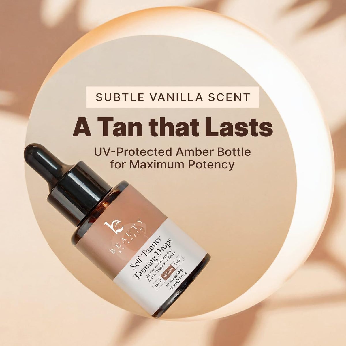 Beauty by Earth bottle next to hand to show compact travel-friendly size