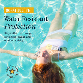 Beauty by Earth sunscreen used by family at beach for water resistant protection