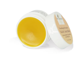Bee Naturals applying balm to cuticles demonstrating quick moisturization