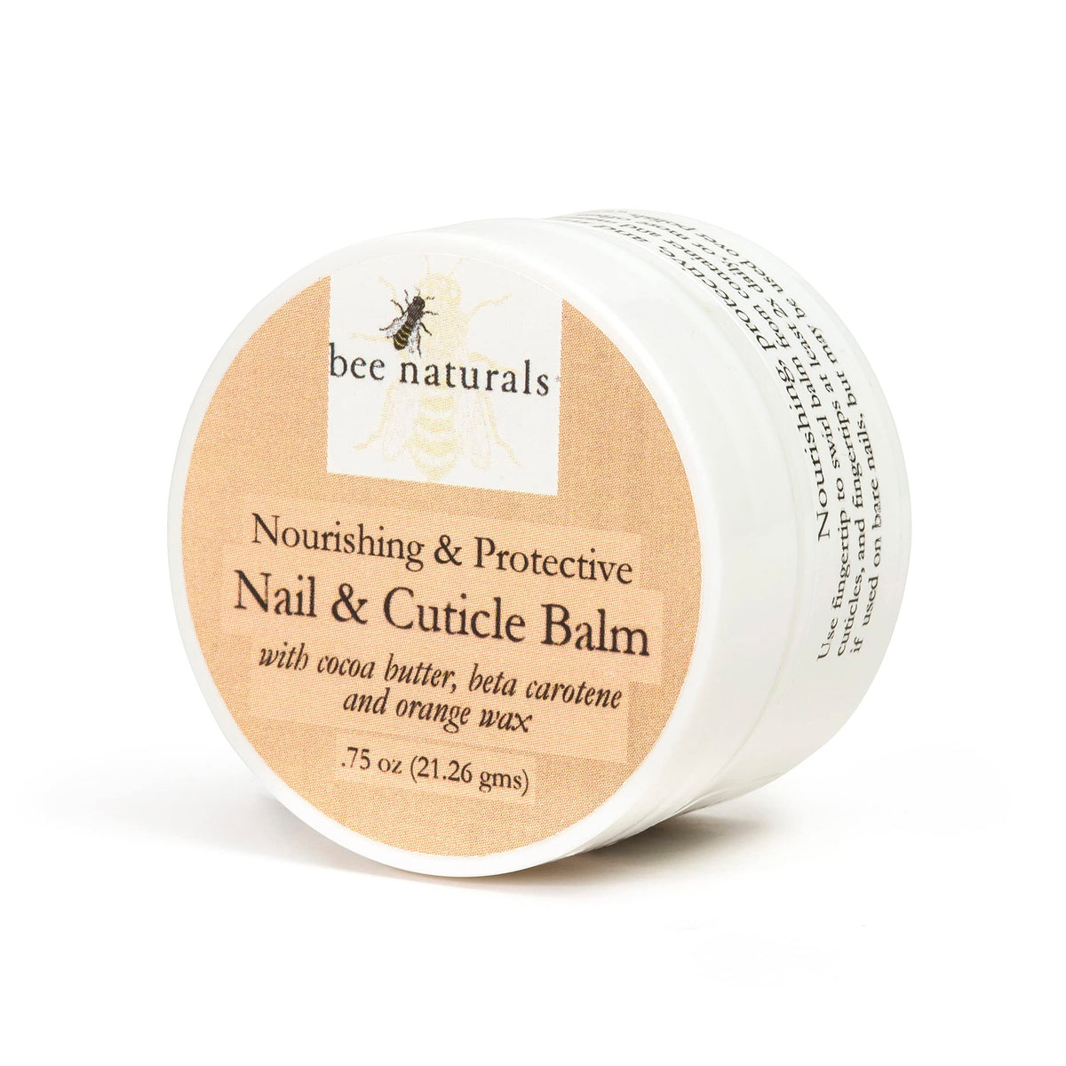 Bee Naturals size comparison with coin showing compact, travel-friendly balm