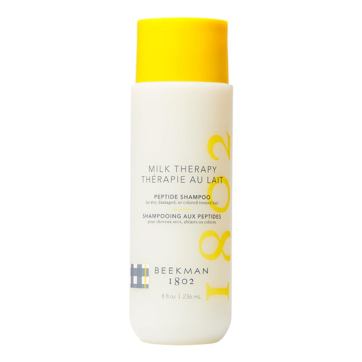 Beekman 1802 bottle front view showing Milk Therapy Peptide Shampoo for repair