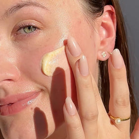 Beekman 1802 cleanser poured into palm creating foam for easy daily cleansing