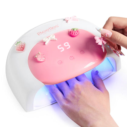 beetles front view of candy white lamp showing compact design and quick curing benefit
