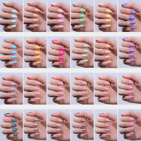 Beetles close-up of French tip and glitter nails showing salon-like sparkle