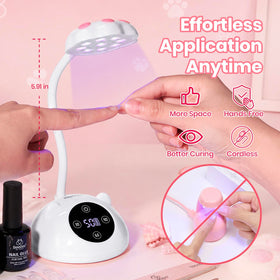 beetles hand next to lamp showing scale and compact size for travel