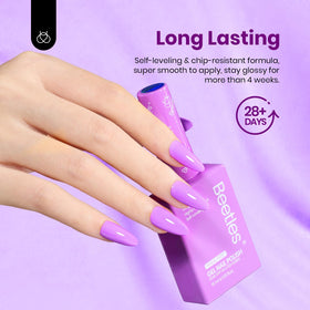 beetles in salon application curing under LED lamp for long-lasting glossy finish benefit