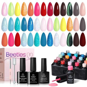 beetles lifestyle beach manicure showing bright nails perfect for summer