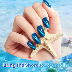 beetles manicure on hand poolside illustrating summer-ready blue nails
