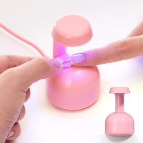 beetles front view of pink mini UV lamp showing compact cure area and portability
