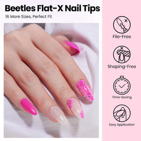 Beetles hands wearing finished almond press-on nails at home