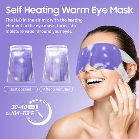 Hand holding a single BeHoomi steam eye mask packet to show compact travel-ready size