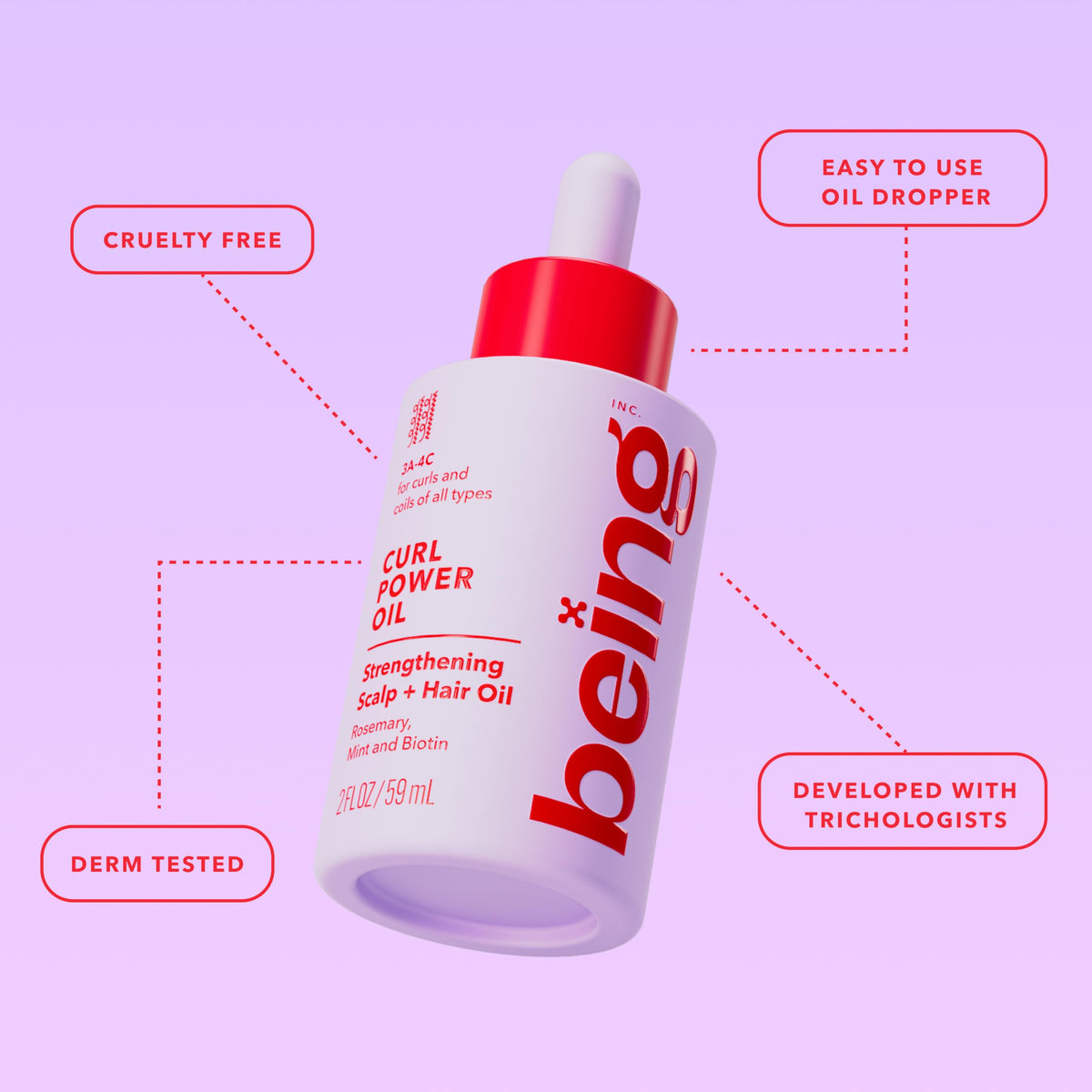 BEING INC smoothing oil onto curls to add definition and glossy shine