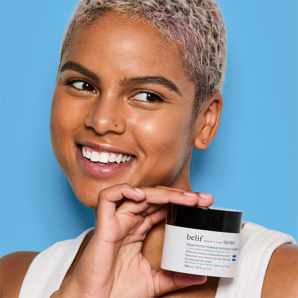 belif cleansing balm turned oil on skin demonstrating effective makeup dissolve