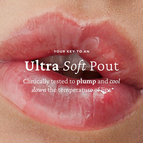 belif hand applying balm to lips demonstrating quick, non-sticky comfort