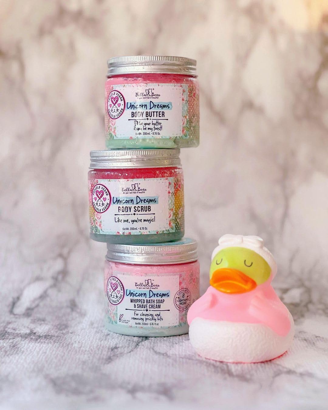 Bella and Bear jar staged on bath shelf showing recyclable packaging and gift-ready look