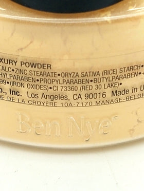 Ben Nye powder in use applied with brush for long-lasting shine control