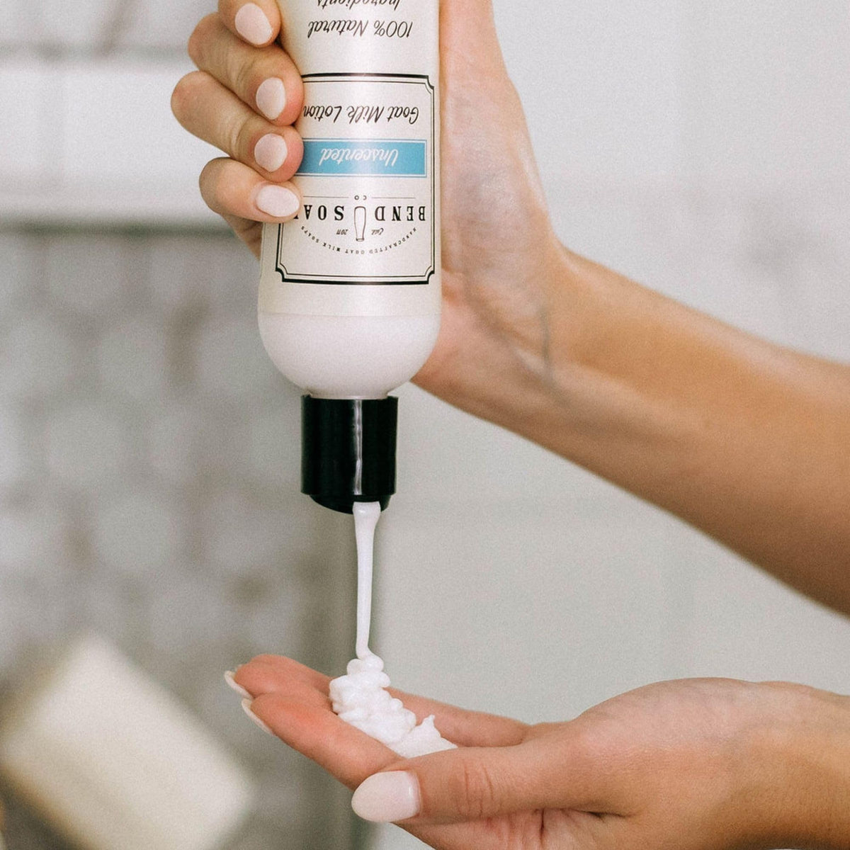 Bend Soap Company bottle held in hand showing size and travel-friendly convenience