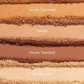 Benefit Hoola Caramel compact in hand demonstrating size and travel-friendly convenience for touch-ups
