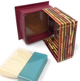 Benefit Hoola applied in mirror lifestyle shot showing natural sun-kissed bronze benefit