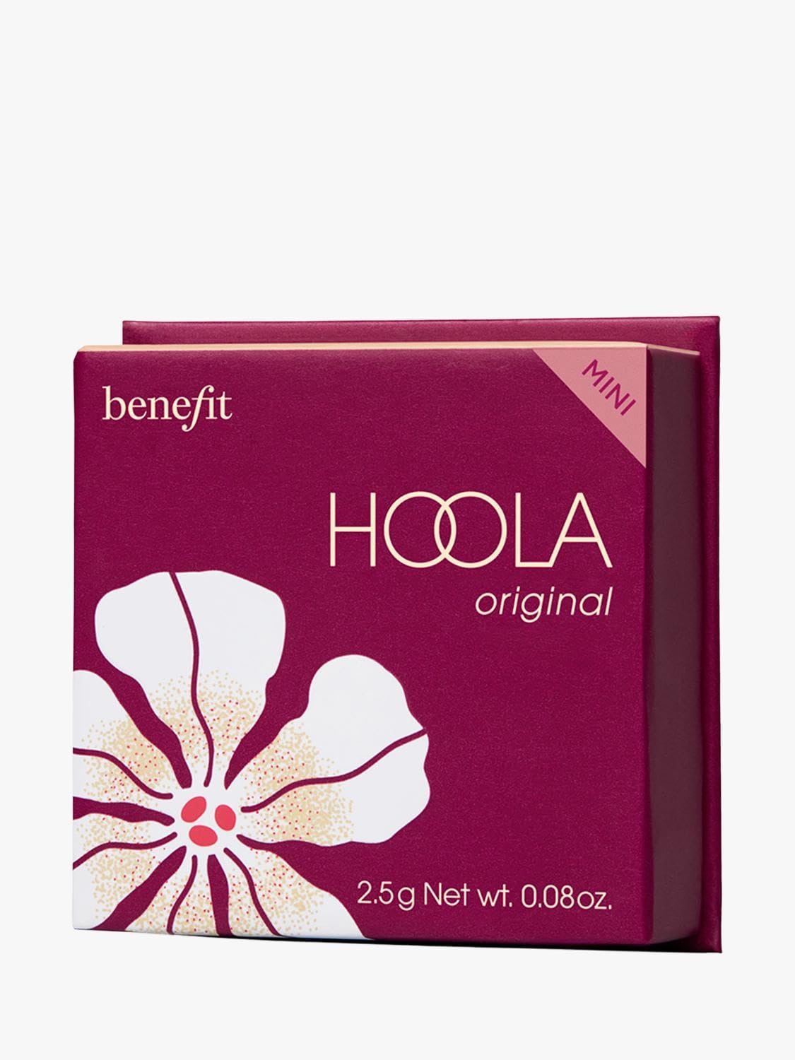 Benefit Hoola Mini next to coin demonstrating small size and portability
