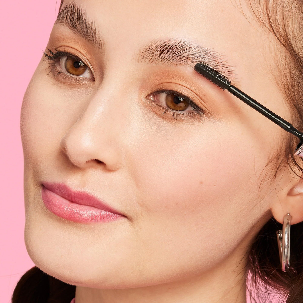 Benefit tube close-up showing compact size and clear gel benefit
