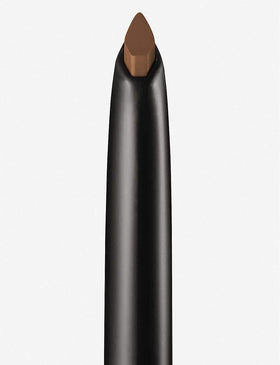 Benefit close-up of triangular pencil tip illustrating precise hair-like strokes