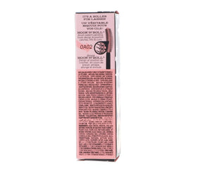 Benefit Roller Lash held in hand illustrating deluxe mini size for travel convenience