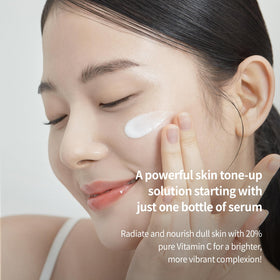 BENTON drop on hand showing dosage and concentrated 20% vitamin C benefit for skin