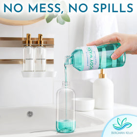 Bergman Kelly bottle being inserted into wall dispenser for fast maintenance