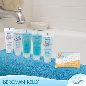 BERGMAN KELLY bar next to a coin for scale demonstrating compact travel-size convenience