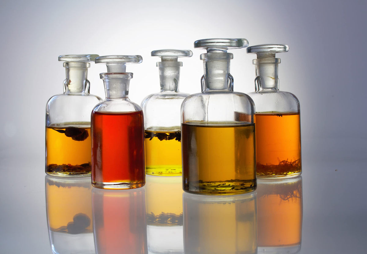 Berry Beautiful pouring oil into hand demonstrating lightweight feel and easy application benefit