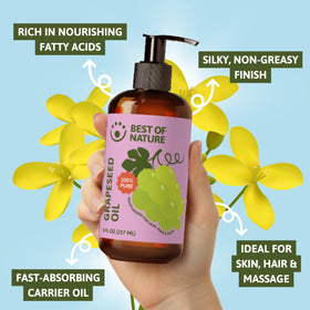 Best of Nature bottle next to hand for scale showing gallon size practicality