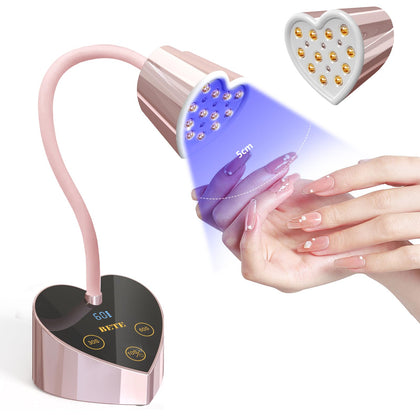 BETE front view of mini UV lamp showing heart shape and compact benefit