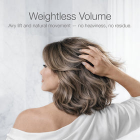 Better Not Younger applying conditioner on damp hair to boost volume