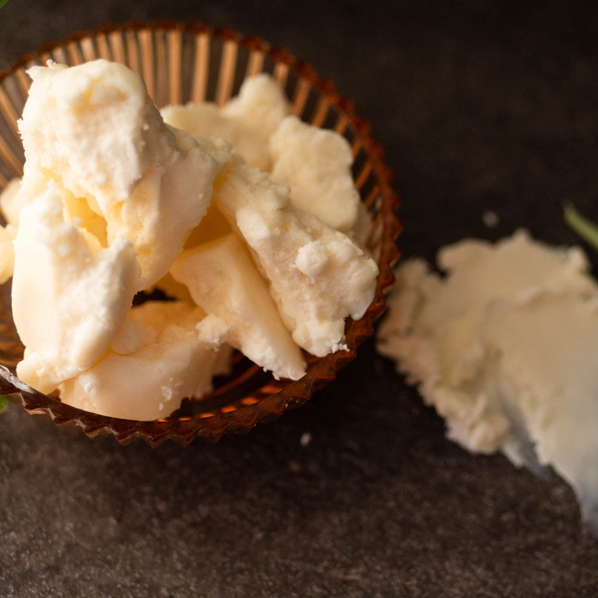 Better Shea Butter block staged with natural ingredients lifestyle appeal