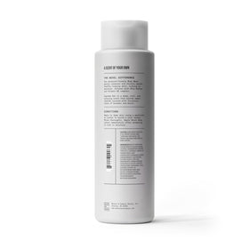 Bevel bottle on shower shelf in lifestyle setting conveying daily grooming routine
