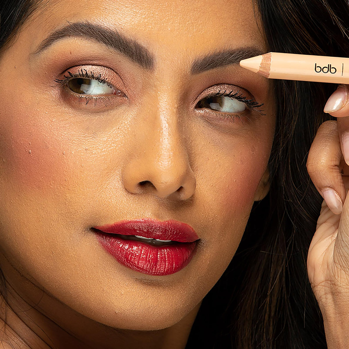 billion dollar brows in hand travel size highlighting compact convenience for on-the-go touchups