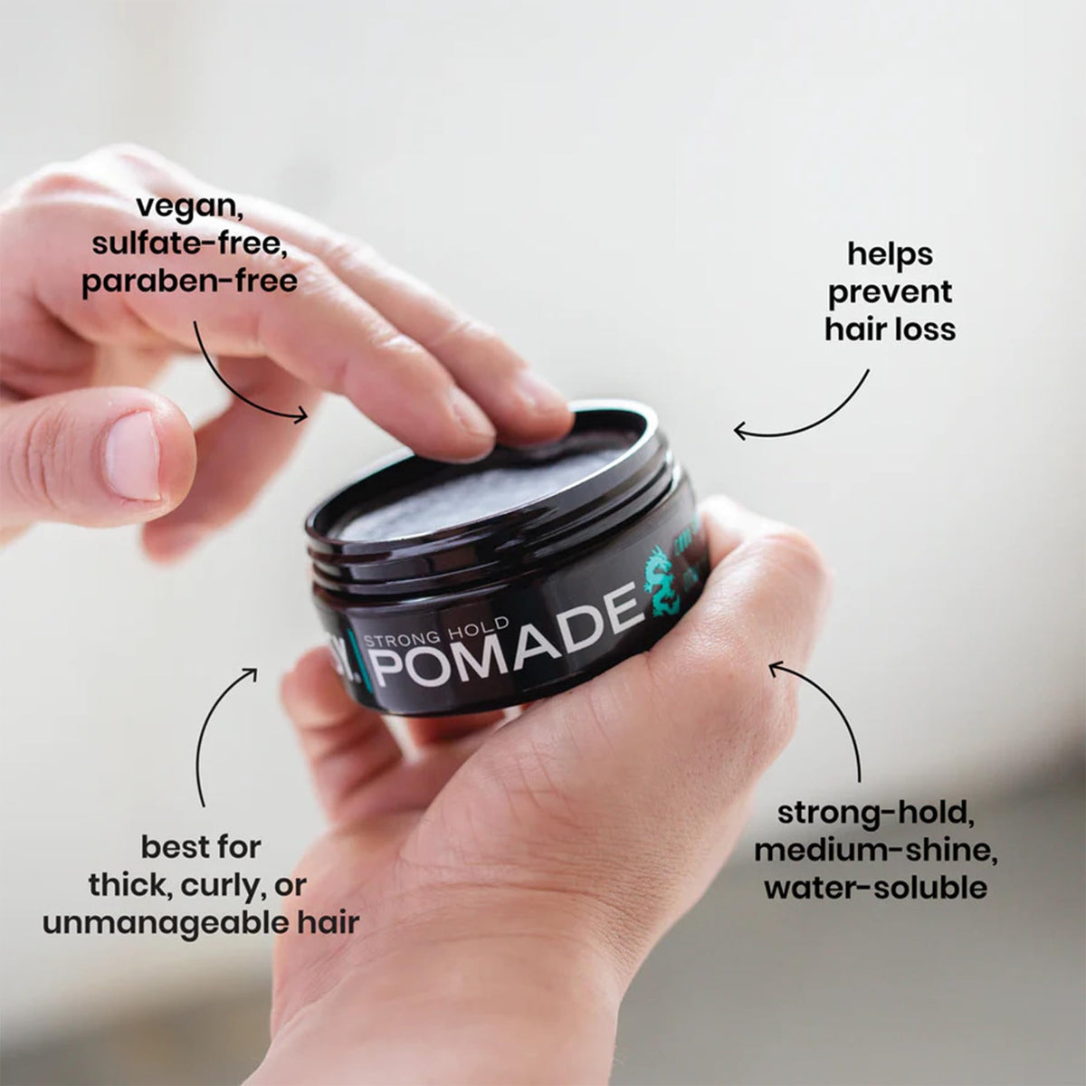 Billy Jealousy pomade in hands demonstrating easy emulsification and control
