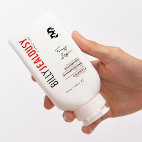 Billy Jealousy bottle in shower setting showing use and refreshing peppermint scent