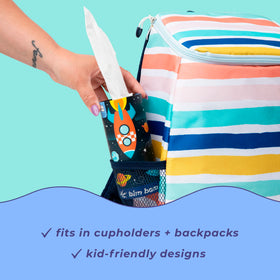 Bim Bam Boo tube next to water bottle showing compact scale for backpacks and travel