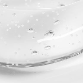 Bioderma Atoderm held in hand illustrating bottle scale and portability