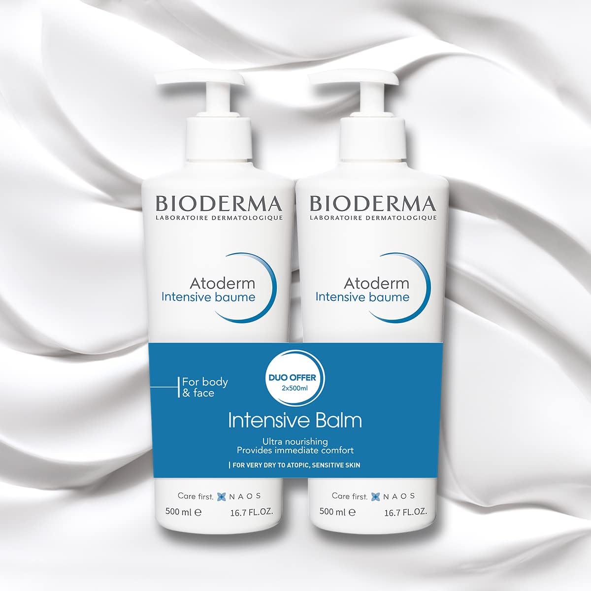 Bioderma Atoderm tubs next to a hand demonstrating the large 16.9 fl oz size and value
