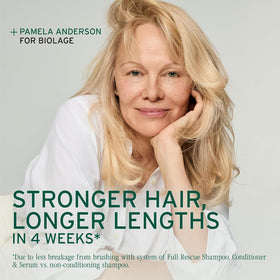 Applying Biolage serum on scalp to fortify roots and improve resilience