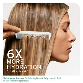 Biolage application on wet hair demonstrating instant detangling