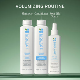 Biolage applying shampoo at roots to boost lift and maintain softness