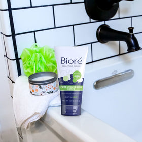 Bioré three-pack next to a ruler showing compact travel-friendly benefit